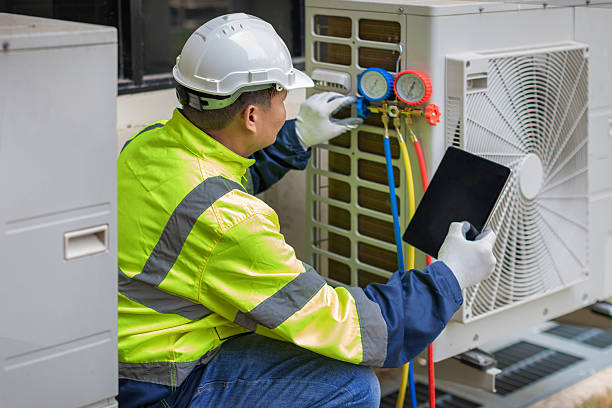 Professional Hvac technician working in Holtsville, NY